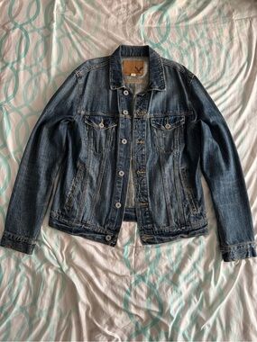 American Eagle Outfitters Light Blue Denim Jacket with Brown Leather Patch